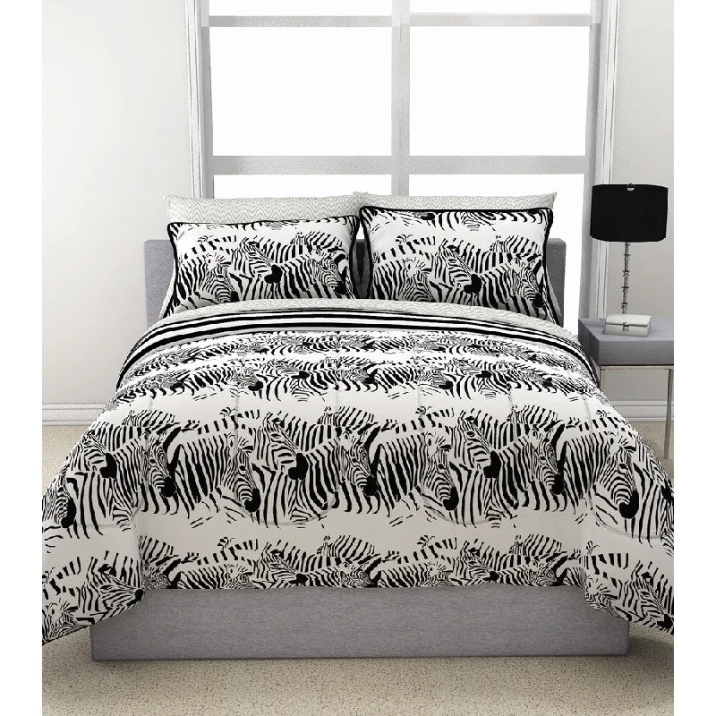 Goose down comforters known for their superior quality and insulationZebra Stampede Reversible Comforter and Sheet Set