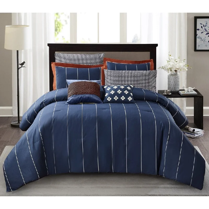 Microfiber - filled comforters that are lightweight and easy to care forPorch & Den Cafield 3-Piece Comforter Set